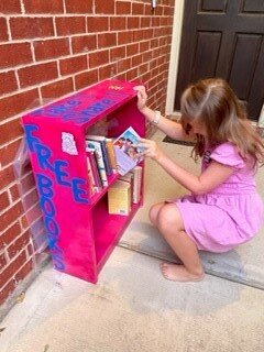 Elementary school student Annie Wallace started a “little library” at her home in order to provide access to books that are no longer available at her school library.